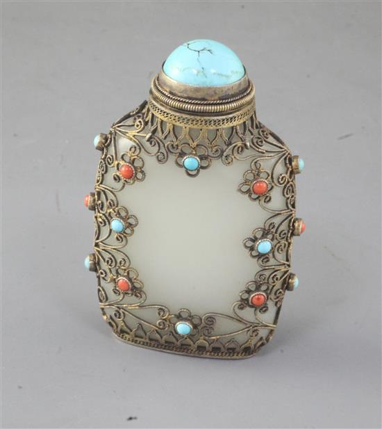 A Chinese pale celadon jade, silver and turquoise and coral mounted snuff bottle, late 19th century, 7.5cm (no. 755)